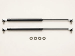 Pair of black SW20 MR2 hood struts with silver end fittings and the four included washers